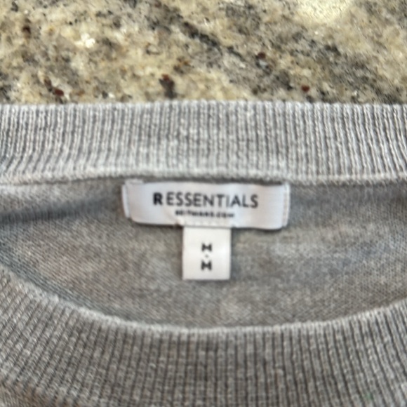 Grey sweater with white stripes. It’s still like new. Size Medium - Picture 3 of 5